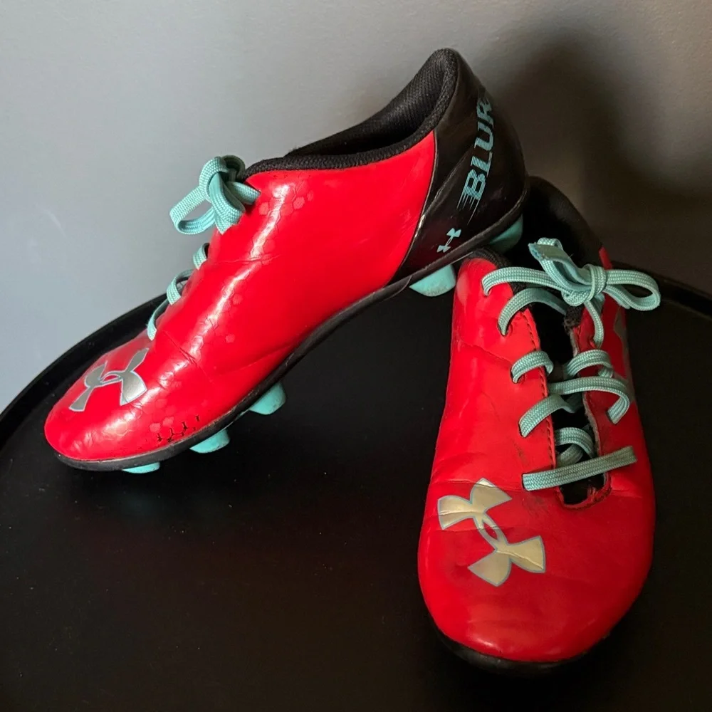 Under Armour size 1 Red and Teal Soccer Cleats